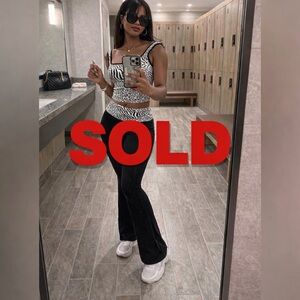 “Zebra Print Crop Top & Black Flare Pants chic,casual